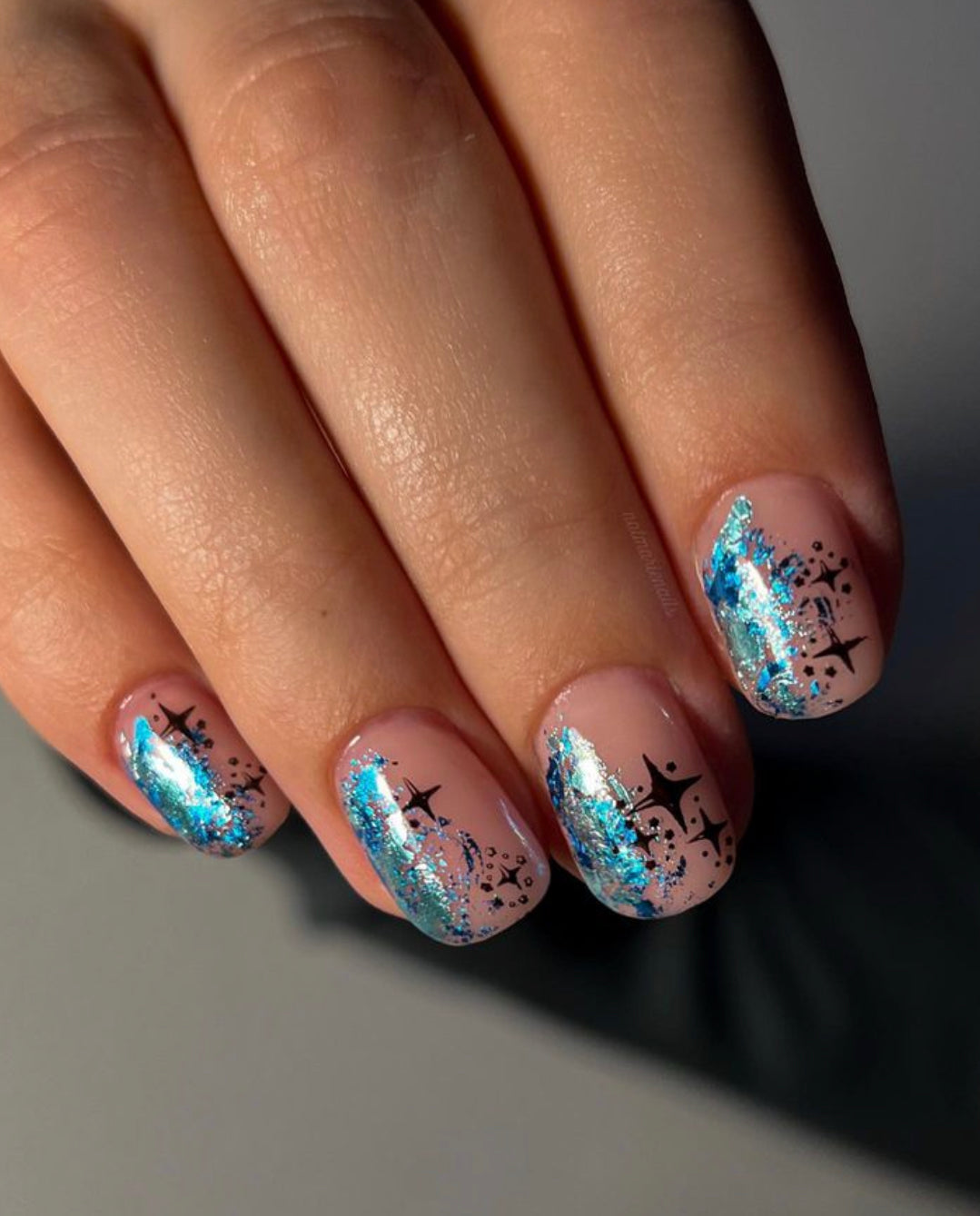 Nails By @natmarienails using metallic Ice Blue foil & Shattered Azure Blue foil